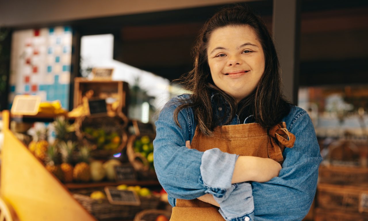 A woman with Down syndrome working.