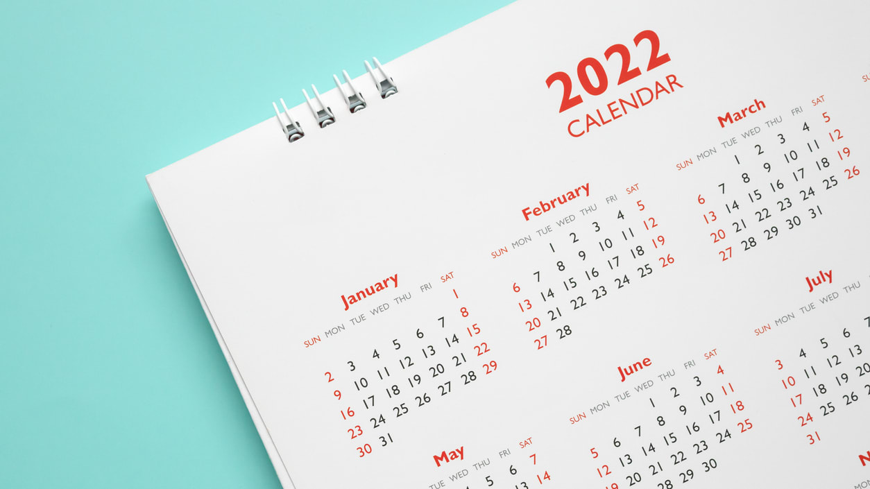 A 2021 calendar on a blue background.