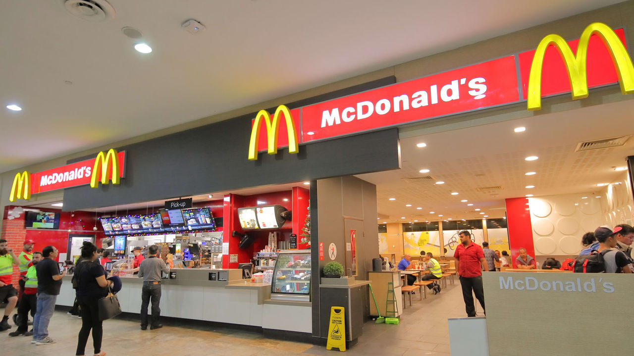 A mcdonald's restaurant in a shopping mall.