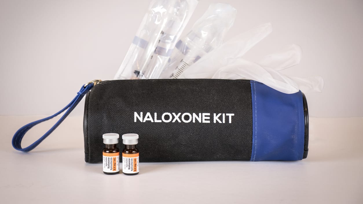 The naloxyone kit is sitting on a table.