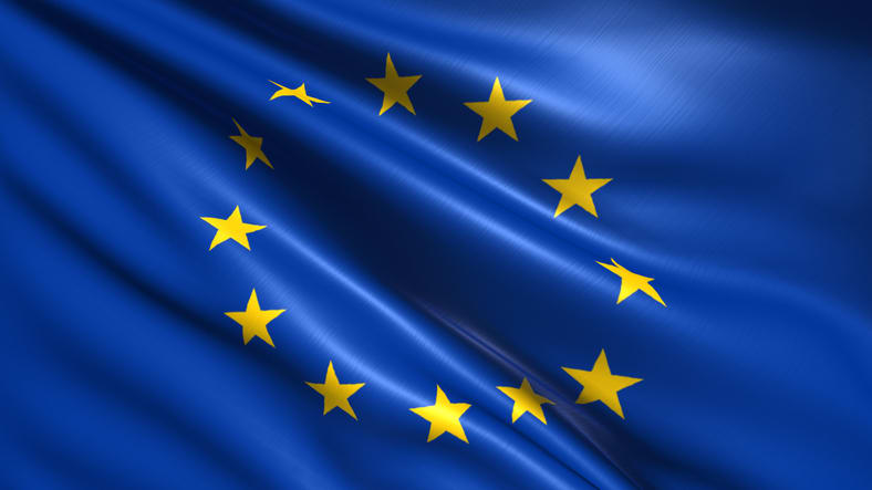 The EU flag waving in the wind.