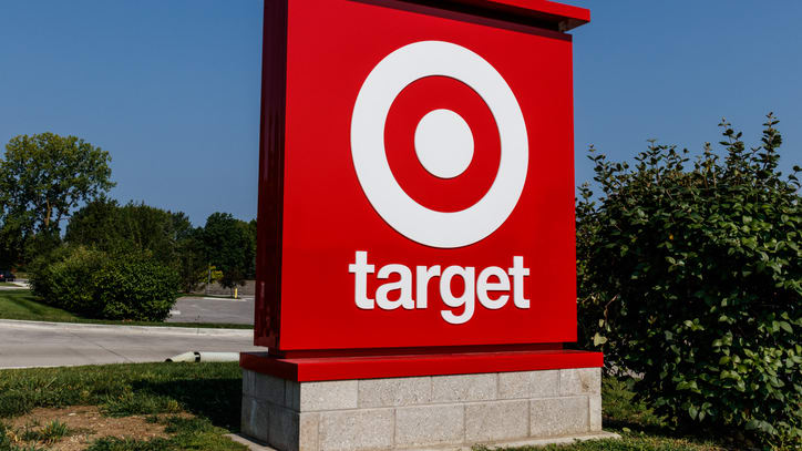 A target store sign in front of a tree.