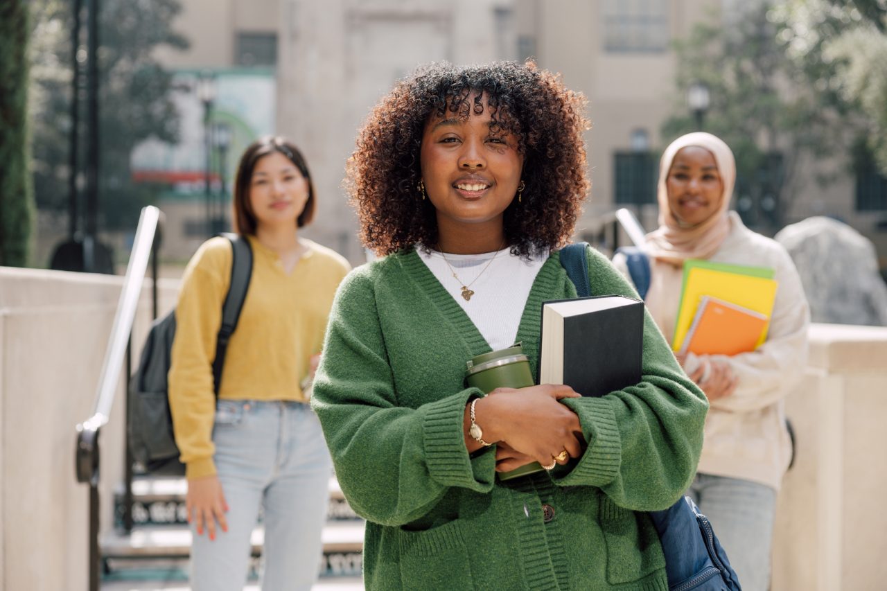 Smiling college students on a university campus