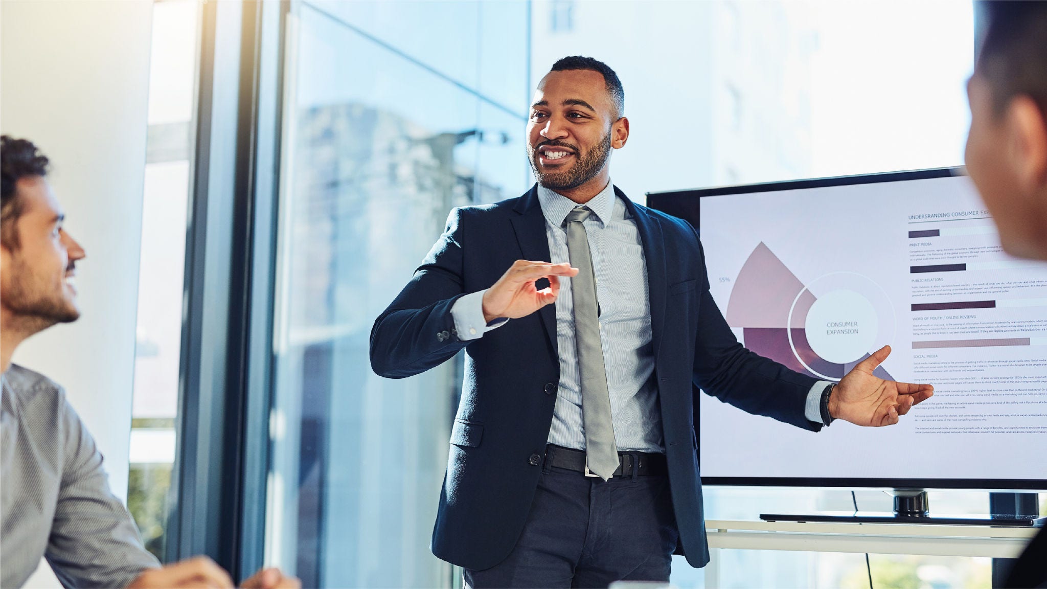R2_RecertificationProviderEligibility_Mocks Executives discusses the data in graphs with his team.