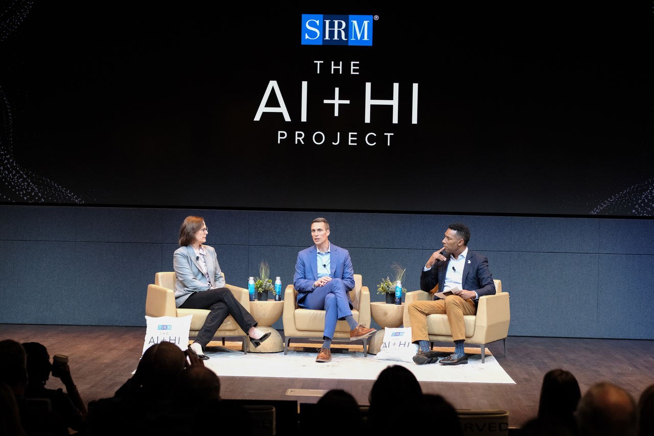 panel of speakers at the SHRM AI+HI conference in March 2024