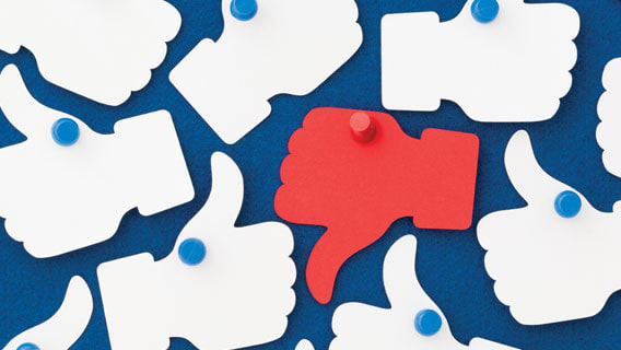 A group of people with red thumbs up and thumbs down on a blue background.