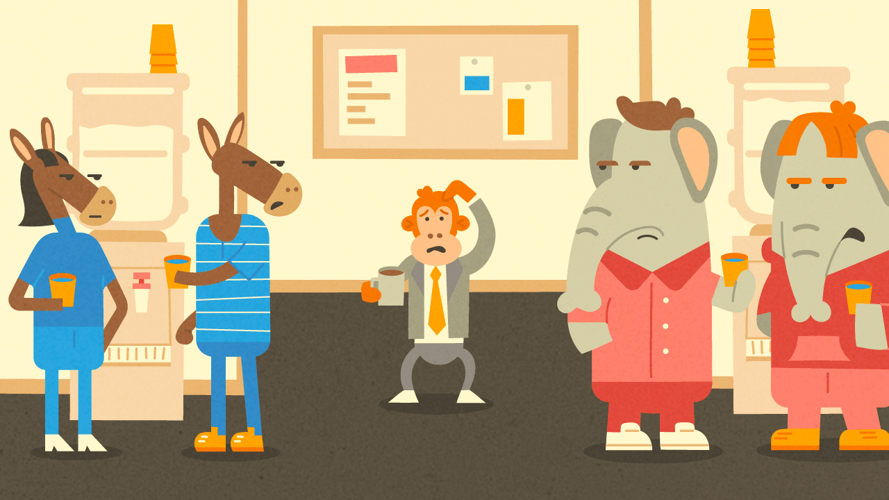 A group of people standing in a room.