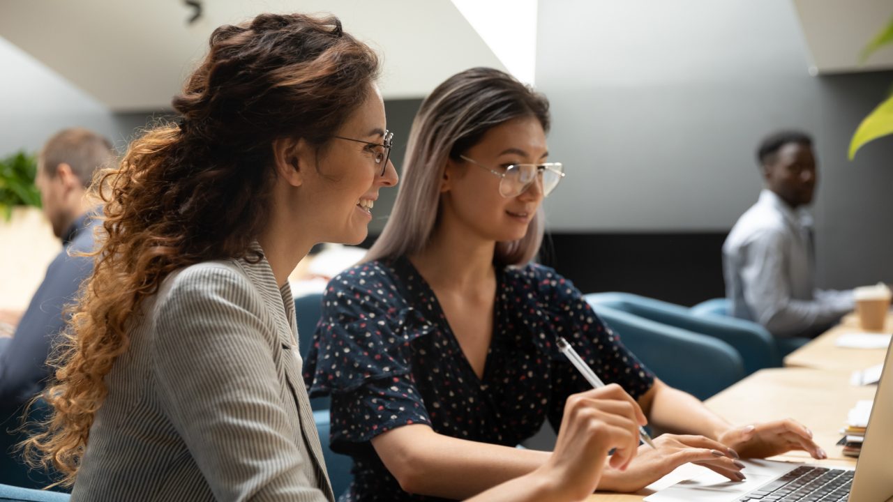 One woman mentoring another woman.